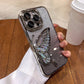 Etui z brokatowym motylem na iPhone'a