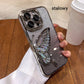 Etui z brokatowym motylem na iPhone'a