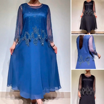 Elegancka sukienka w jednolitym kolorze z połyskującą, prześwitującą nakładką