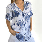 Damska koszula z kwiatowym nadrukiem i guzikami