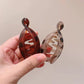 Spinka do włosów zwiększająca objętość kucyka
