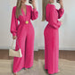 Elegáns V-nyakú, széles szárú jumpsuit övvel